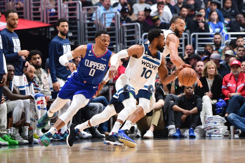 LOS ANGELES, CA - FEBRUARY 28: Mike Conley #10 of the Minnesota Timberwolves dribbles the ball during the game against the LA Clippers on February 28, 2023 at Crypto.Com Arena in Los Angeles, California. NOTE TO USER: User expressly acknowledges and agrees that, by downloading and/or using this Photograph, user is consenting to the terms and conditions of the Getty Images License Agreement. Mandatory Copyright Notice: Copyright 2023 NBAE (Photo by Adam Pantozzi/NBAE via Getty Images)