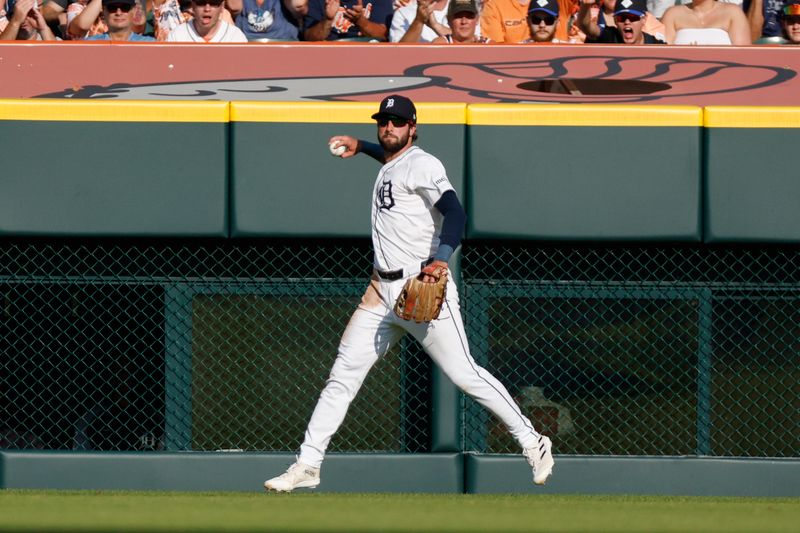 Jul 27, 2024; Detroit, Michigan, USA; Detroit Tigers center fielder Matt Vierling (8) throws to the infield during the second inning against the Minnesota Twins at Comerica Park. Mandatory Credit: Brian Bradshaw Sevald-USA TODAY Sports