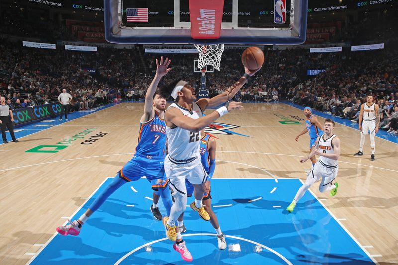 OKLAHOMA CITY, OK - JANUARY 31: Zeke Nnaji #22 of the Denver Nuggets drives to the basket during the game against the Oklahoma City Thunder on January 31, 2024 at Paycom Arena in Oklahoma City, Oklahoma. NOTE TO USER: User expressly acknowledges and agrees that, by downloading and or using this photograph, User is consenting to the terms and conditions of the Getty Images License Agreement. Mandatory Copyright Notice: Copyright 2024 NBAE (Photo by Zach Beeker/NBAE via Getty Images)