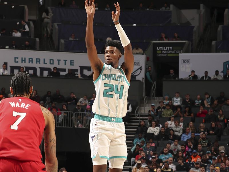 CHARLOTTE, NC - NOVEMBER 27:  Brandon Miller #24 of the Charlotte Hornets shoots a three point basket during the game against the Miami Heat on November 27, 2024 at Spectrum Center in Charlotte, North Carolina. NOTE TO USER: User expressly acknowledges and agrees that, by downloading and or using this photograph, User is consenting to the terms and conditions of the Getty Images License Agreement. Mandatory Copyright Notice: Copyright 2024 NBAE (Photo by Kent Smith/NBAE via Getty Images)