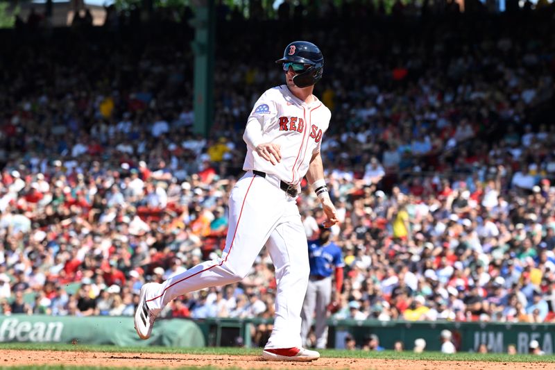 Jun 29, 2025; Boston, Massachusetts, USA; Boston Red Sox second baseman Nick Sogard (20) checks for a fair ball while scoring a run on an RBI by first baseman Romy Gonzalez (23) (not pictured) during the fifth inning against the Toronto Blue Jays at Fenway Park. Mandatory Credit: Eric Canha-Imagn Images