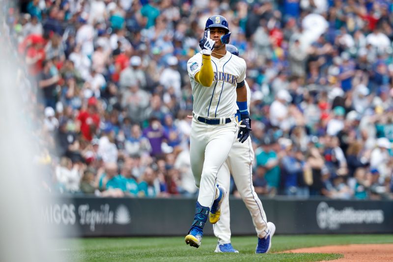 May 28, 2023; Seattle, Washington, USA; Seattle Mariners center fielder Julio Rodriguez (44) runs the bases after hitting a solo-home run against the Pittsburgh Pirates during the first inning at T-Mobile Park. Mandatory Credit: Joe Nicholson-USA TODAY Sports