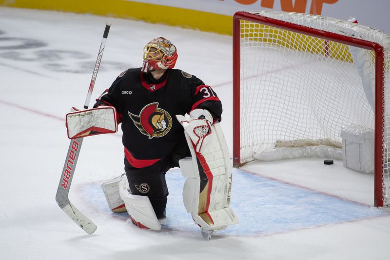 Dec 23, 2023; Ottawa, Ontario, CAN; Ottawa Senators goalie Anton Forsberg (31) reacts to a goal scored by the Pittsburgh Penguins in the third period at the Canadian Tire Centre. Mandatory Credit: Marc DesRosiers-USA TODAY Sports