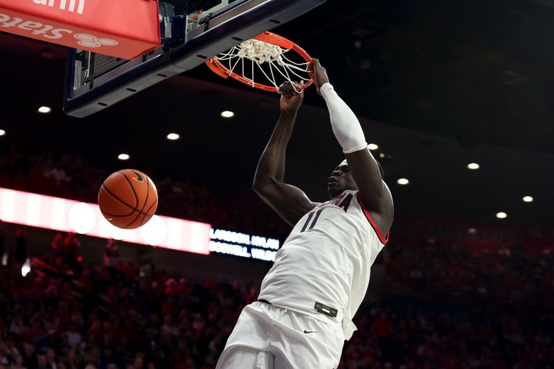 Nov 6, 2023; Tucson, Arizona, USA; Arizona Wildcats center Oumar Ballo (11) dunks against the Morgan State Bears during the second half at McKale Center. Mandatory Credit: Zachary BonDurant-USA TODAY Sports