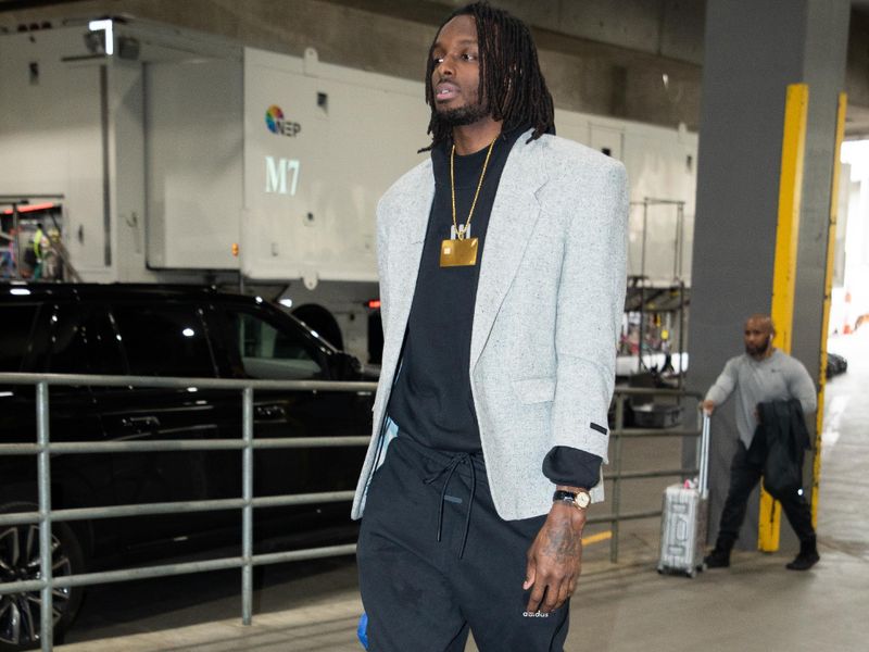 PORTLAND, OR - MARCH 13:  Jerami Grant #9 of the Portland Trail Blazers arrives to the arena before the game on March 13, 2024 at the Moda Center Arena in Portland, Oregon. NOTE TO USER: User expressly acknowledges and agrees that, by downloading and or using this photograph, user is consenting to the terms and conditions of the Getty Images License Agreement. Mandatory Copyright Notice: Copyright 2024 NBAE (Photo by Cameron Browne/NBAE via Getty Images)