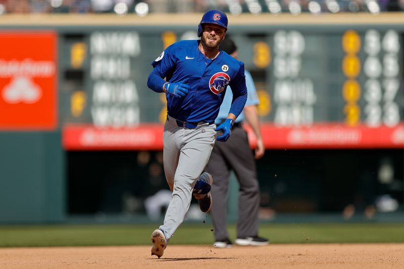 Sep 15, 2024; Denver, Colorado, USA; Chicago Cubs first baseman Michael Busch (29) rounds the bases on a solo home run in the seventh inning against the Colorado Rockies at Coors Field. Mandatory Credit: Isaiah J. Downing-Imagn Images