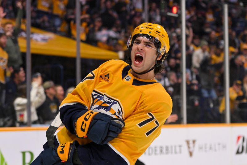 Oct 28, 2025; Nashville, Tennessee, USA;  Nashville Predators right wing Luke Evangelista (77) celebrates his goal against the Tampa Bay Lightning during the third period at Bridgestone Arena. Mandatory Credit: Steve Roberts-Imagn Images