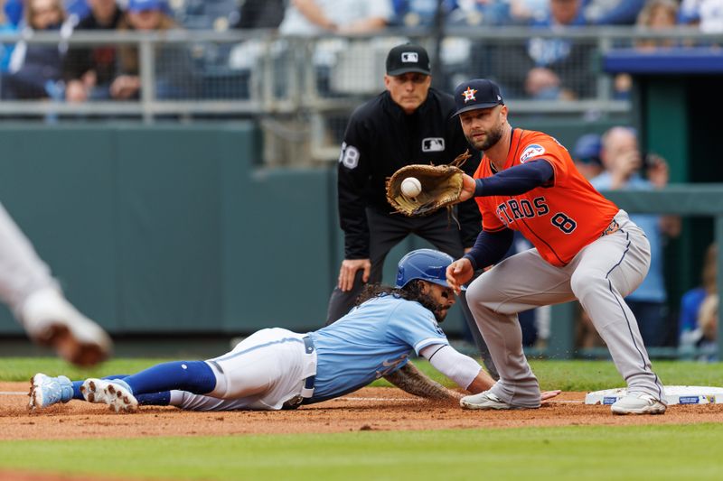 Apr 27, 2025; Kansas City, Missouri, USA; Kansas City Royals third baseman Jonathan India (6) dives back under a throw to Houston Astros first baseman Christian Walker (8) during the first inning at Kauffman Stadium. Mandatory Credit: William Purnell-Imagn Images