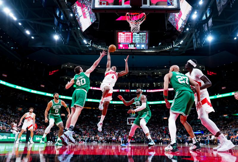 TORONTO, ON - OCTOBER 15: Scottie Barnes #4 of the Toronto Raptors goes to the basket against Luke Kornet #40 of the Boston Celtics during the first half of their preseason basketball game at the Scotiabank Arena on October 15, 2024 in Toronto, Ontario, Canada. NOTE TO USER: User expressly acknowledges and agrees that, by downloading and/or using this Photograph, user is consenting to the terms and conditions of the Getty Images License Agreement. (Photo by Mark Blinch/Getty Images)