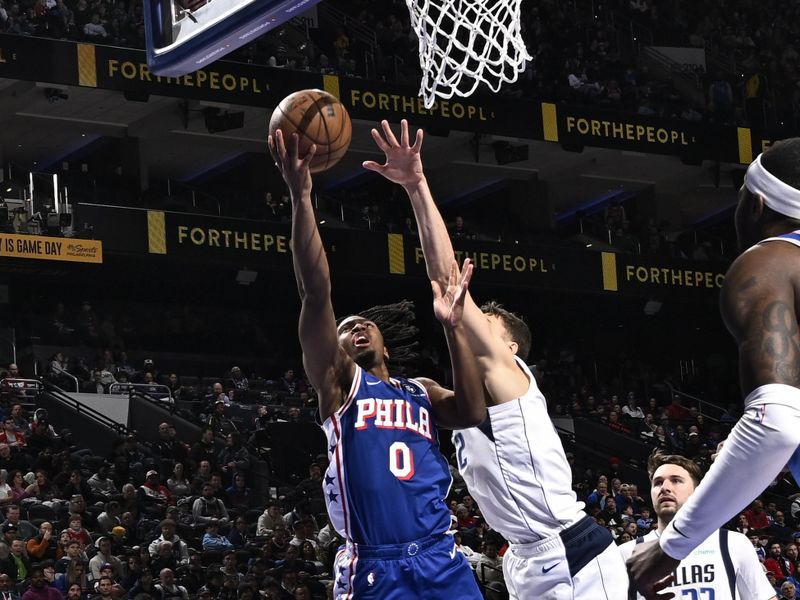 PHILADELPHIA, PA - FEBRUARY 5: Tyrese Maxey #0 of the Philadelphia 76ers drives to the basket during the game against the Dallas Mavericks on February 5, 2024 at the Wells Fargo Center in Philadelphia, Pennsylvania NOTE TO USER: User expressly acknowledges and agrees that, by downloading and/or using this Photograph, user is consenting to the terms and conditions of the Getty Images License Agreement. Mandatory Copyright Notice: Copyright 2024 NBAE (Photo by David Dow/NBAE via Getty Images)