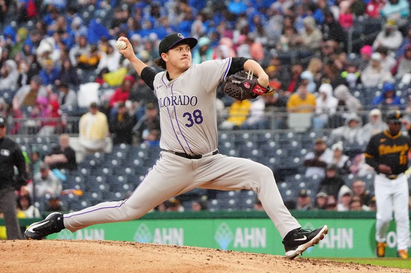 May 4, 2024; Pittsburgh, Pennsylvania, USA; Colorado Rockies pitcher Victor Vodnik (38) delivers a pitch against the Pittsburgh Pirates during the seventh inning at PNC Park. Mandatory Credit: Gregory Fisher-USA TODAY Sports