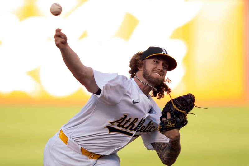 Jun 5, 2024; Oakland, California, USA; Oakland Athletics starting pitcher Joey Estes (68) delivers a pitch against the Seattle Mariners during the first inning at Oakland-Alameda County Coliseum. Mandatory Credit: D. Ross Cameron-USA TODAY Sports