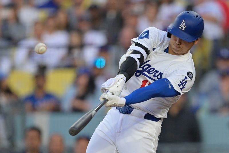 Jun 4, 2025; Los Angeles, California, USA; Los Angeles Dodgers two-way player Shohei Ohtani (17) grounds out during the first inning against the New York Mets at Dodger Stadium. Mandatory Credit: Jayne Kamin-Oncea-Imagn Images