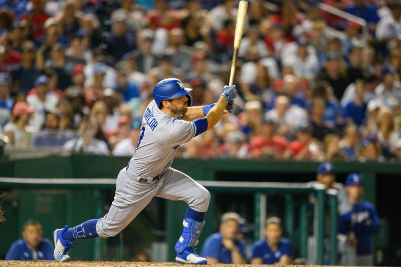 Sep 8, 2023; Washington, District of Columbia, USA; Los Angeles Dodgers shortstop Chris Taylor (3) hits a double during the sixth inning against the Washington Nationals at Nationals Park. Mandatory Credit: Reggie Hildred-USA TODAY Sports