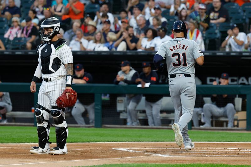Aug 23, 2024; Chicago, Illinois, USA; Detroit Tigers outfielder Riley Greene (31) scores against the Chicago White Sox during the first inning at Guaranteed Rate Field. Mandatory Credit: Kamil Krzaczynski-USA TODAY Sports