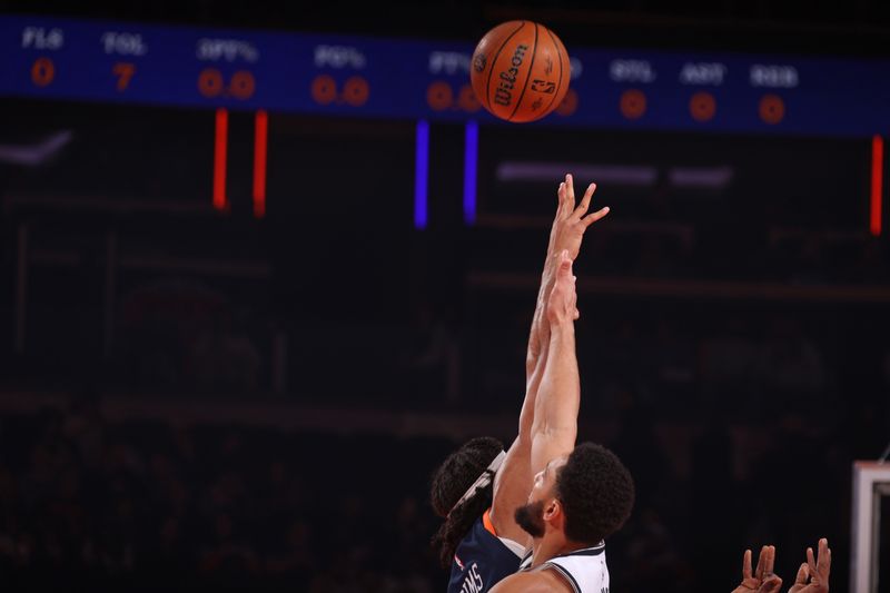 NEW YORK, NY - NOVEMBER 15: Jericho Sims #20 of the New York Knicks and Ben Simmons #10 of the Brooklyn Nets go for the opening tip-off during the game during the Emirates NBA Cup game on November 15, 2024 at Madison Square Garden in New York City, New York.  NOTE TO USER: User expressly acknowledges and agrees that, by downloading and or using this photograph, User is consenting to the terms and conditions of the Getty Images License Agreement. Mandatory Copyright Notice: Copyright 2024 NBAE  (Photo by Nathaniel S. Butler/NBAE via Getty Images)