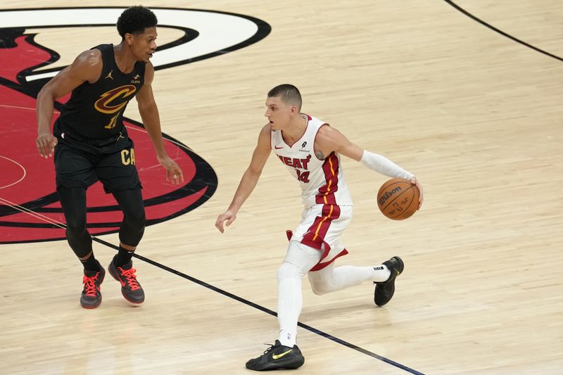MIAMI, FL - APRIL 26: Tyler Herro #14 of the Miami Heat handles the ball during the game against the Cleveland Cavaliers during Round 1 Game 3 of the 2025 NBA Playoffs on April 26, 2025 at Kaseya Center in Miami, Florida. NOTE TO USER: User expressly acknowledges and agrees that, by downloading and or using this Photograph, user is consenting to the terms and conditions of the Getty Images License Agreement. Mandatory Copyright Notice: Copyright 2025 NBAE(Photo by Eric Espada/NBAE via Getty Images)