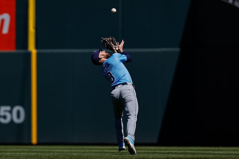 Apr 7, 2024; Denver, Colorado, USA; Tampa Bay Rays second baseman Brandon Lowe (8) makes a catch for an out in the fourth inning against the Colorado Rockies at Coors Field. Mandatory Credit: Isaiah J. Downing-USA TODAY Sports