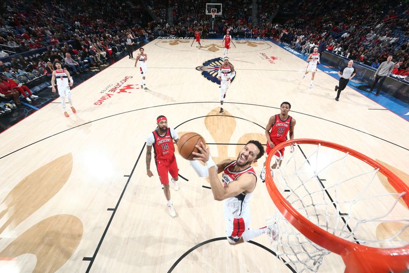 NEW ORLEANS, LA - FEBRUARY 14: Landry Shamet #20 of the Washington Wizards drives to the basket during the game against the New Orleans Pelicans on February 14, 2024 at the Smoothie King Center in New Orleans, Louisiana. NOTE TO USER: User expressly acknowledges and agrees that, by downloading and or using this Photograph, user is consenting to the terms and conditions of the Getty Images License Agreement. Mandatory Copyright Notice: Copyright 2024 NBAE (Photo by Layne Murdoch Jr./NBAE via Getty Images)