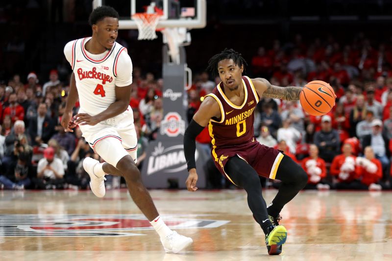 Dec 3, 2023; Columbus, Ohio, USA;  Minnesota Golden Gophers guard Elijah Hawkins (0) dribbles the ball as Ohio State Buckeyes guard Dale Bonner (4) defends during the first half at Value City Arena. Mandatory Credit: Joseph Maiorana-USA TODAY Sports