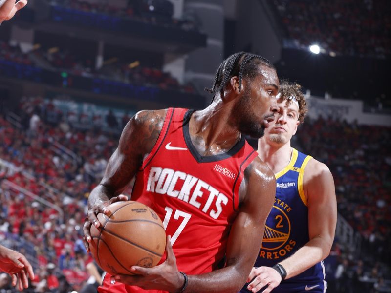 HOUSTON, TX - APRIL 20: Tari Eason #17 of the Houston Rockets handles the ball during the game against the Golden State Warriors during Round One Game One of the 2025 NBA Playoffs on April 20, 2025 at the Toyota Center in Houston, Texas. NOTE TO USER: User expressly acknowledges and agrees that, by downloading and or using this photograph, User is consenting to the terms and conditions of the Getty Images License Agreement. Mandatory Copyright Notice: Copyright 2025 NBAE (Photo by Logan Riely/NBAE via Getty Images)