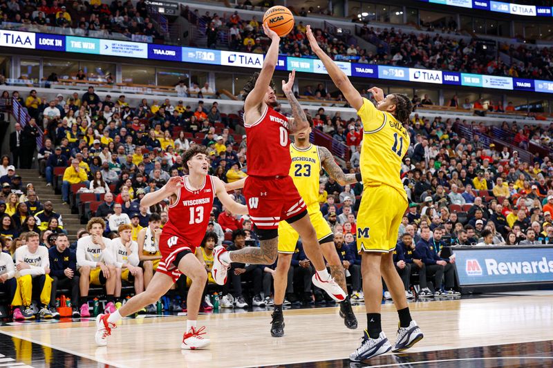 Mar 14, 2026; Chicago, IL, USA; Michigan Wolverines guard Patrick Liburd (0) shoots against Michigan Wolverines guard Roddy Gayle Jr. (11) during the first half at United Center. Mandatory Credit: Kamil Krzaczynski-Imagn Images Mar 14, 2026; Chicago, IL, USA; Michigan Wolverines guard Patrick Liburd (0) shoots against Michigan Wolverines guard Roddy Gayle Jr. (11) during the first half at United Center. Mandatory Credit: Kamil Krzaczynski-Imagn Images