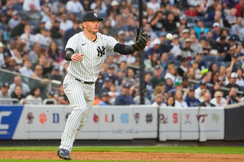 Jun 22, 2023; Bronx, New York, USA;  New York Yankees third baseman Josh Donaldson (28) bobbles the ball after fielding a ground ball hit by Seattle Mariners designated hitter Mike Ford (not pictured) during the third inning at Yankee Stadium. Mandatory Credit: Gregory Fisher-USA TODAY Sports