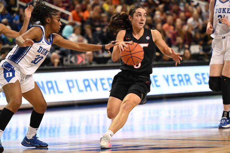 Mar 4, 2023; Greensboro, NC, USA; Virginia Tech Hokies guard Georgia Amoore (5) drives down court against Duke Blue Devils guard Shayeann Day-Wilson (30) during the first half at Greensboro Coliseum. Mandatory Credit: William Howard-USA TODAY Sports