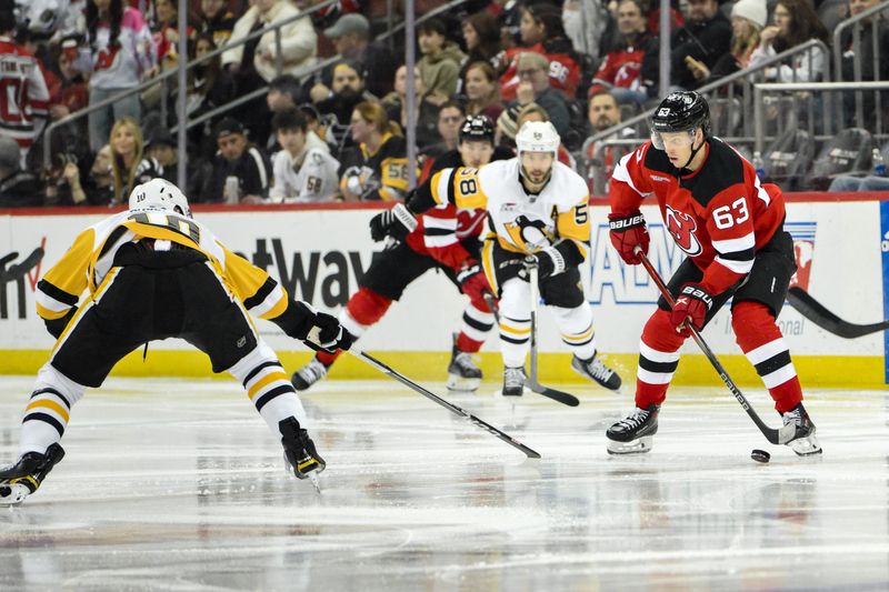 New Jersey Devils Stumble as Pittsburgh Penguins Soar in Newark