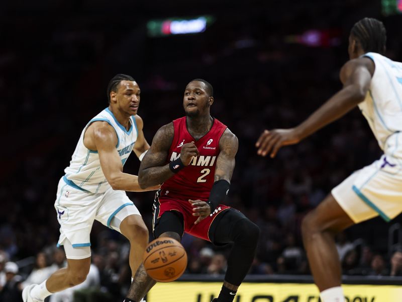 MIAMI, FLORIDA - MARCH 10: Terry Rozier #2 of the Miami Heat makes a pass during the first quarter against the Charlotte Hornets at Kaseya Center on March 10, 2025 in Miami, Florida. NOTE TO USER: User expressly acknowledges and agrees that, by downloading and or using this photograph, User is consenting to the terms and conditions of the Getty Images License Agreement. (Photo by Brennan Asplen/Getty Images)