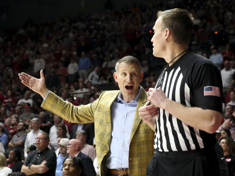 Feb 21, 2024; Tuscaloosa, Alabama, USA;  Alabama Crimson Tide head coach Nate Oats protests to officials during the first half against the Florida Gators at Coleman Coliseum. Mandatory Credit: Gary Cosby Jr.-USA TODAY Sports