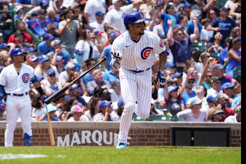 Jun 18, 2023; Chicago, Illinois, USA; Chicago Cubs designated hitter Christopher Morel (5) hits a two-run homer against the Baltimore Orioles during the fourth inning at Wrigley Field. Mandatory Credit: David Banks-USA TODAY Sports