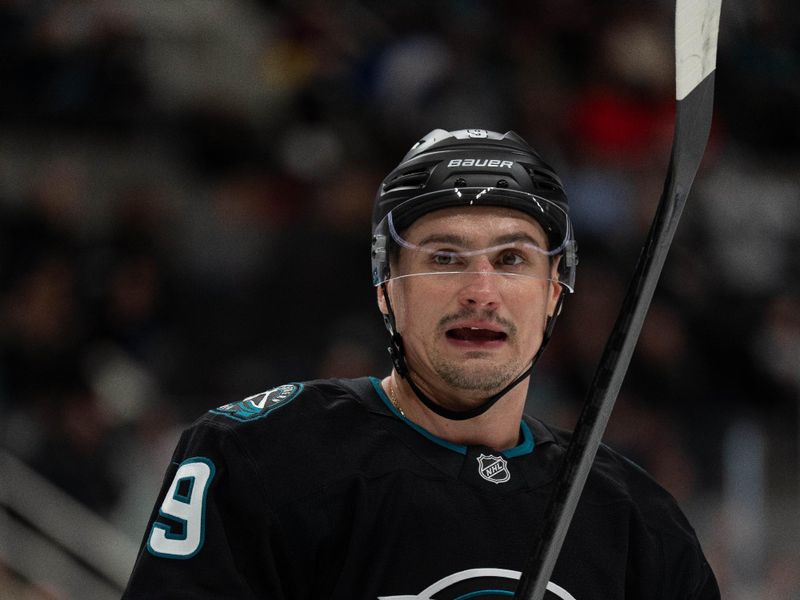Oct 14, 2025; San Jose, California, USA;  San Jose Sharks defenseman Dmitry Orlov (9) during the first period against the Carolina Hurricanes at SAP Center at San Jose. Mandatory Credit: Stan Szeto-Imagn Images