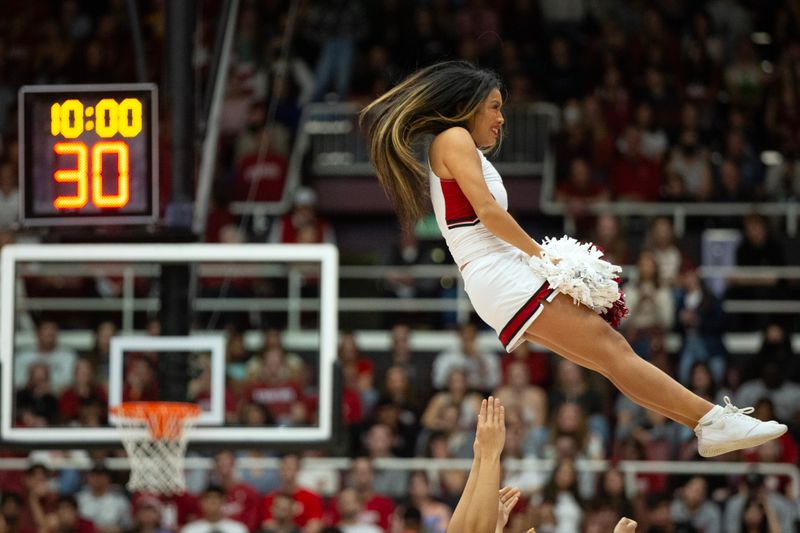 Jan 21, 2024; Stanford, California, USA; Stanford Cardinal cheerleaders entertain the crowd during the fourth quarter against the Oregon State Beavers at Maples Pavilion. Mandatory Credit: D. Ross Cameron-USA TODAY Sports