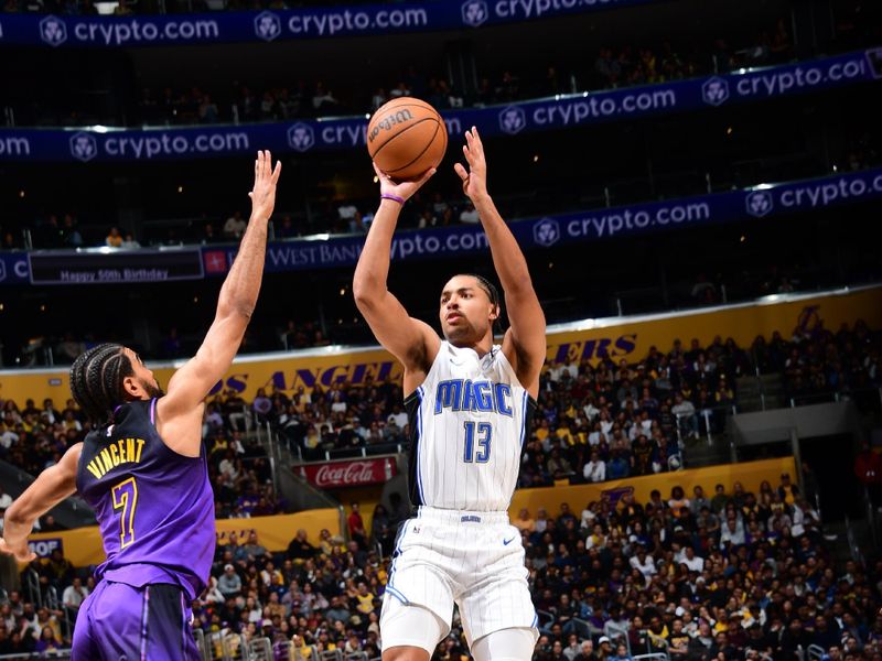 LOS ANGELES, CA - NOVEMBER 21: Jett Howard #13 of the Orlando Magic shoots the ball during the game against the Los Angeles Lakers on November 21, 2024 at Crypto.Com Arena in Los Angeles, California. NOTE TO USER: User expressly acknowledges and agrees that, by downloading and/or using this Photograph, user is consenting to the terms and conditions of the Getty Images License Agreement. Mandatory Copyright Notice: Copyright 2024 NBAE (Photo by Adam Pantozzi/NBAE via Getty Images)