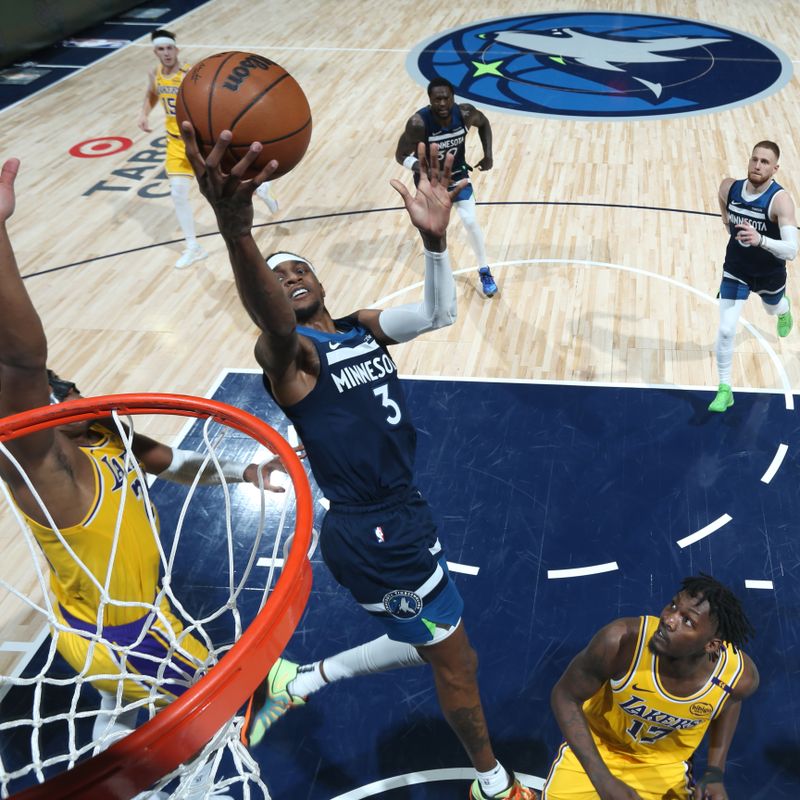 MINNEAPOLIS, MN -  APRIL 25:    Jaden McDaniels #3 of the Minnesota Timberwolves drives to the basket during the game against the Los Angeles Lakers during Round 1 Game 3 of the 2025 NBA Playoffs  on April 25, 2025 at Target Center in Minneapolis, Minnesota. NOTE TO USER: User expressly acknowledges and agrees that, by downloading and or using this Photograph, user is consenting to the terms and conditions of the Getty Images License Agreement. Mandatory Copyright Notice: Copyright 2025 NBAE (Photo by David Sherman/NBAE via Getty Images)