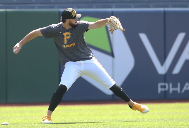 May 11, 2025; Pittsburgh, Pennsylvania, USA;  Pittsburgh Pirates pitcher Paul Skenes (30) throws in the outfield before the game against the Atlanta Braves at PNC Park. Mandatory Credit: Charles LeClaire-Imagn Images