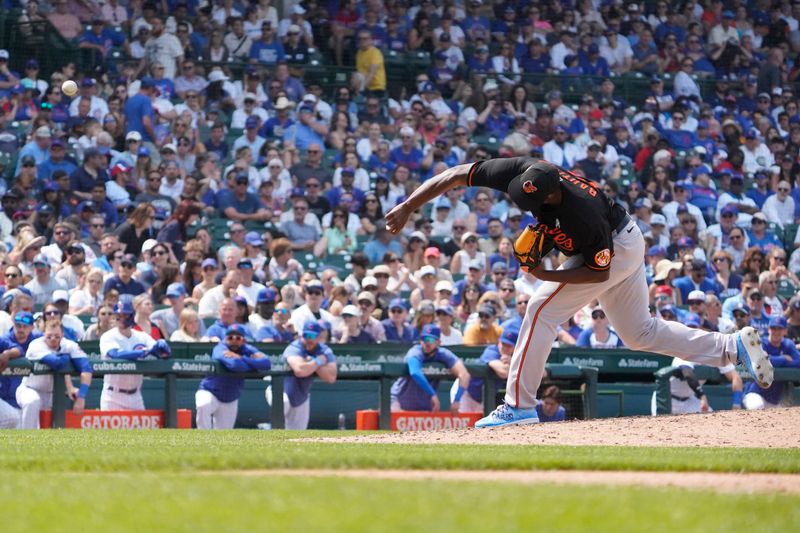 Jun 18, 2023; Chicago, Illinois, USA; Baltimore Orioles relief pitcher Felix Bautista (74) throws the ball against the Chicago Cubs during the ninth inning at Wrigley Field. Mandatory Credit: David Banks-USA TODAY Sports