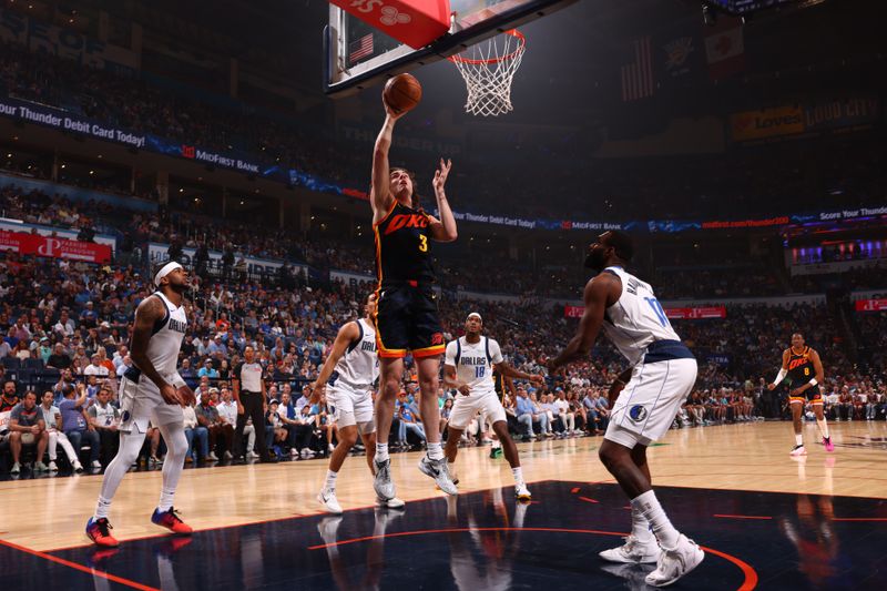 OKLAHOMA CITY, OK - APRIL 14:  Josh Giddey #3 of the Oklahoma City Thunder shoots the ball during the game against the Dallas Mavericks on April 14, 2024 at Paycom Arena in Oklahoma City, Oklahoma. NOTE TO USER: User expressly acknowledges and agrees that, by downloading and or using this photograph, User is consenting to the terms and conditions of the Getty Images License Agreement. Mandatory Copyright Notice: Copyright 2024 NBAE (Photo by Zach Beeker/NBAE via Getty Images)