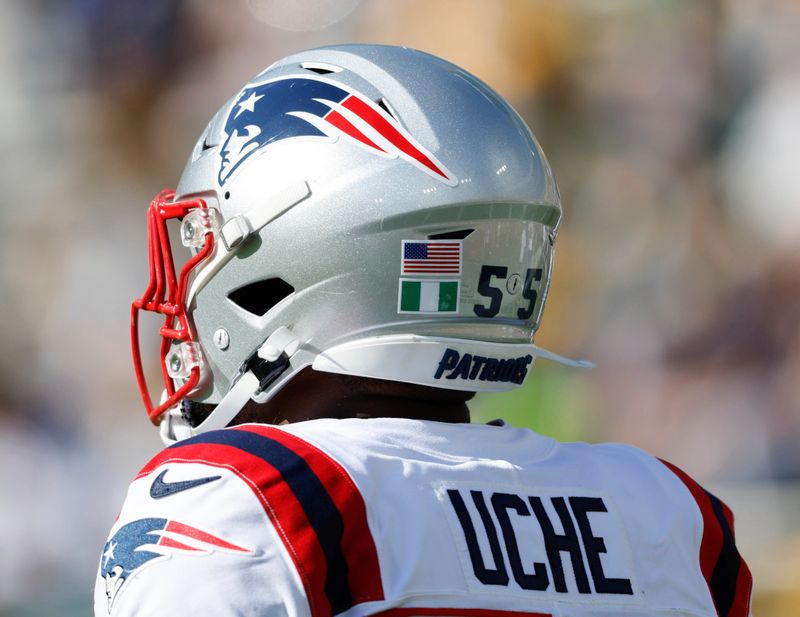 New England Patriots linebacker Josh Uche (55) practices before an NFL football game Sunday, Oct. 2, 2022, in Green Bay, Wis. (AP Photo/Jeffrey Phelps)