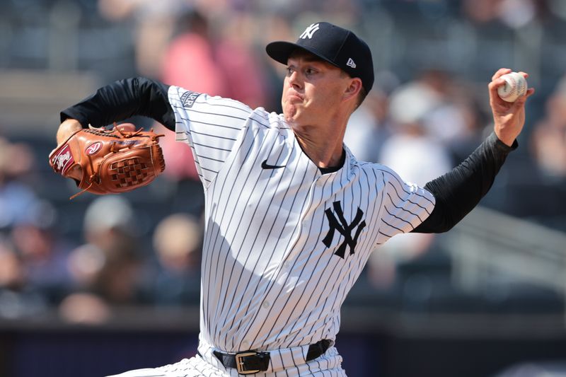 Jul 6, 2024; Bronx, New York, USA; New York Yankees relief pitcher Josh Maciejewski (63) delivers a pitch during the ninth inning against the Boston Red Sox at Yankee Stadium. Mandatory Credit: Vincent Carchietta-USA TODAY Sports