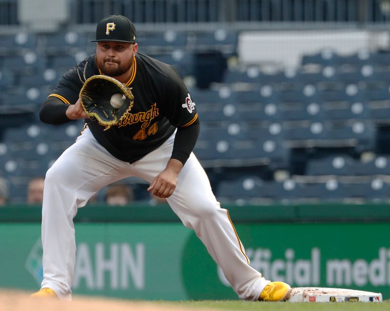 Apr 24, 2024; Pittsburgh, Pennsylvania, USA;  Pittsburgh Pirates first base Rowdy Tellez (44) takes a throw at first base to retire Milwaukee Brewers designated hitter Rhys Hoskins (not pictured) during the second inning at PNC Park. Mandatory Credit: Charles LeClaire-USA TODAY Sports