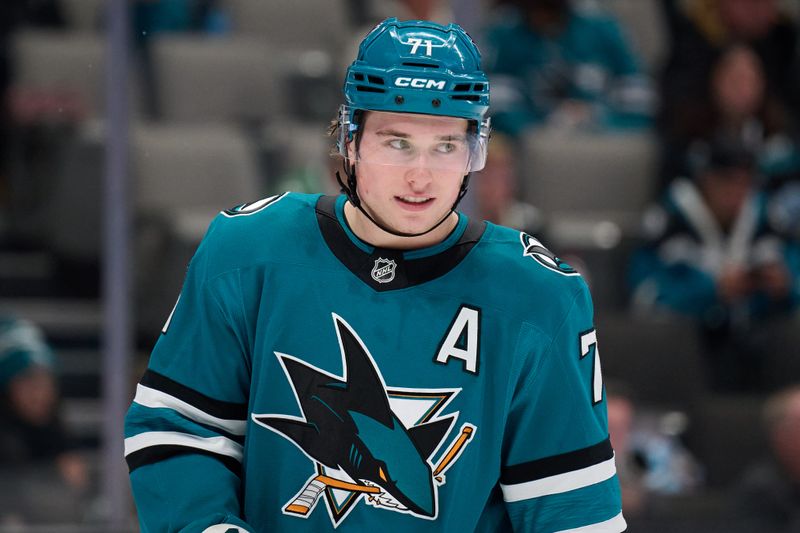 Dec 18, 2025; San Jose, California, USA; San Jose Sharks center Macklin Celebrini (71) looks on against the Dallas Stars during the first period at SAP Center at San Jose. Mandatory Credit: Robert Edwards-Imagn Images