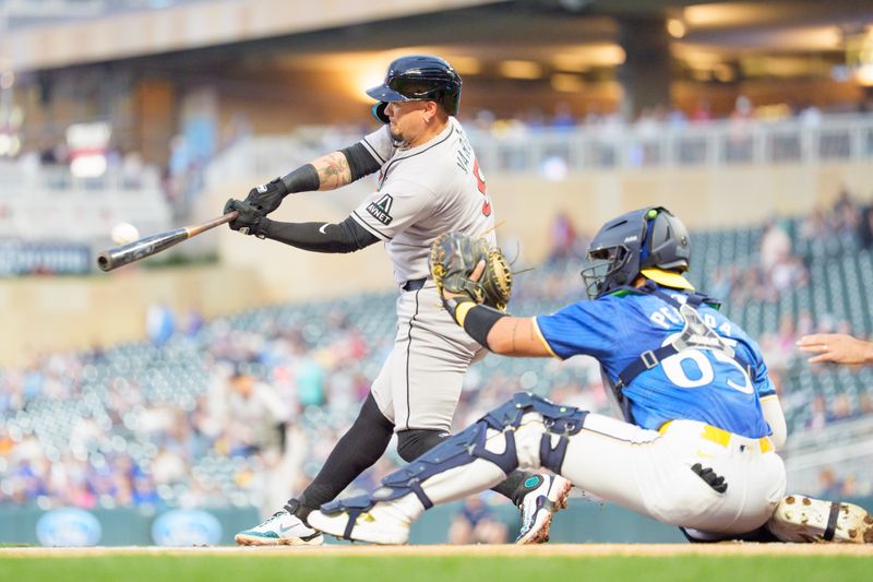 Sep 12, 2025; Minneapolis, Minnesota, USA; Arizona Diamondbacks second base Ildemaro Vargas (6) hits a fly ball to center field in the first inning at Target Field. Mandatory Credit: Matt Blewett-Imagn Images