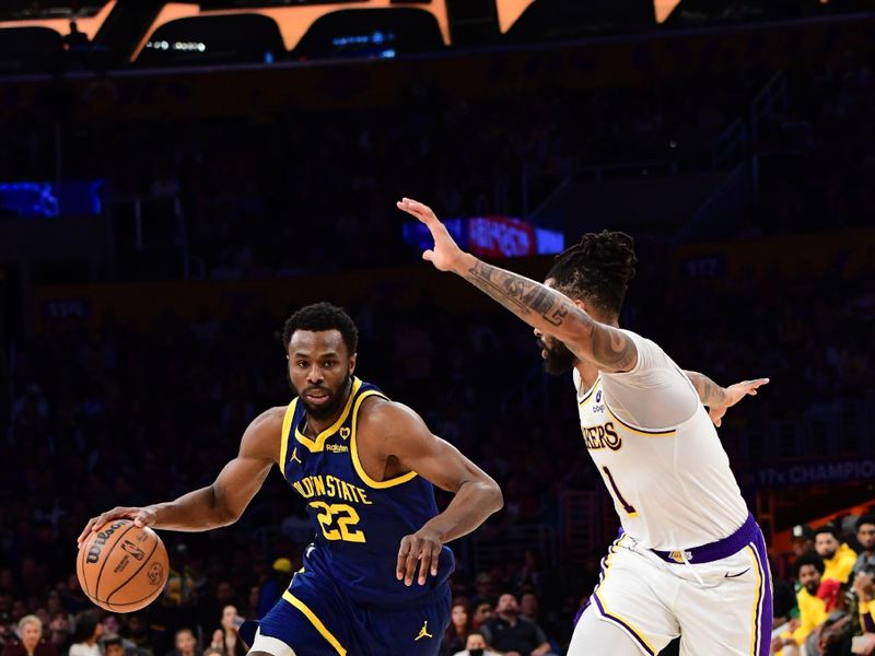 LOS ANGELES, CA - MACH 16:  Andrew Wiggins #22 of the Golden State Warriors dribbles the ball during the game against the Los Angeles Lakers on March 16, 2024 at Crypto.Com Arena in Los Angeles, California. NOTE TO USER: User expressly acknowledges and agrees that, by downloading and/or using this Photograph, user is consenting to the terms and conditions of the Getty Images License Agreement. Mandatory Copyright Notice: Copyright 2024 NBAE (Photo by Adam Pantozzi/NBAE via Getty Images)