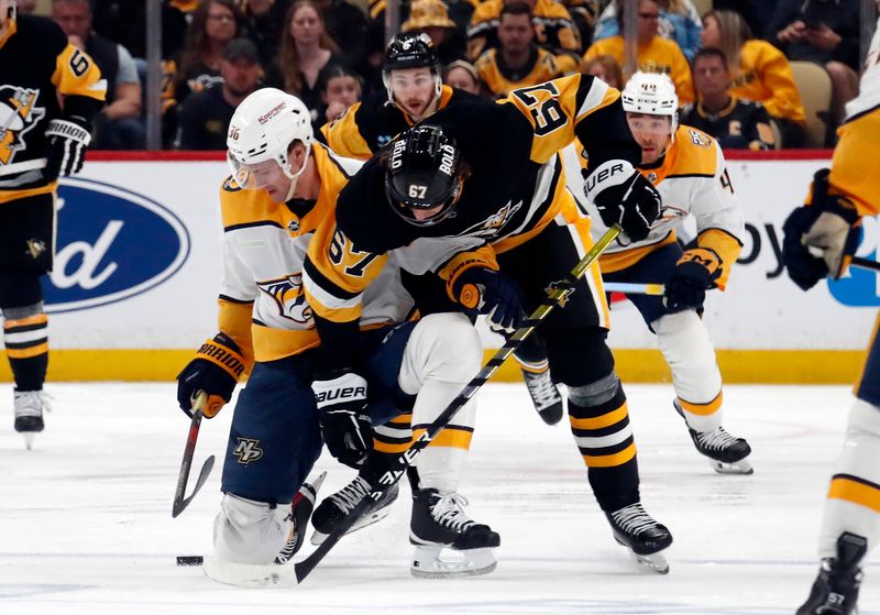 Apr 15, 2024; Pittsburgh, Pennsylvania, USA;  Nashville Predators left wing Cole Smith (36) and Pittsburgh Penguins right wing Rickard Rakell (67) battle for the puck during the third period at PPG Paints Arena. The Penguins won 4-2. Mandatory Credit: Charles LeClaire-USA TODAY Sports