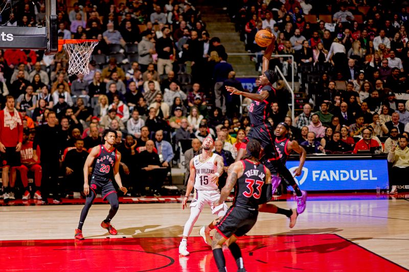 TORONTO, CANADA - FEBRUARY 23: Chris Boucher #25 of the Toronto Raptors dunks the ball against the New Orleans Pelicans on February 23, 2023 at the Scotiabank Arena in Toronto, Ontario, Canada.  NOTE TO USER: User expressly acknowledges and agrees that, by downloading and or using this Photograph, user is consenting to the terms and conditions of the Getty Images License Agreement.  Mandatory Copyright Notice: Copyright 2023 NBAE (Photo by Mark Blinch/NBAE via Getty Images)