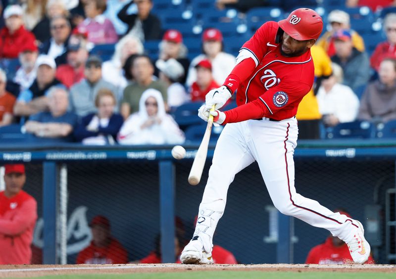 Mar 20, 2023; West Palm Beach, Florida, USA;  Washington Nationals first baseman Dominic Smith (22) bats against the New York Mets during the first inning at The Ballpark of the Palm Beaches. Mandatory Credit: Rhona Wise-USA TODAY Sports