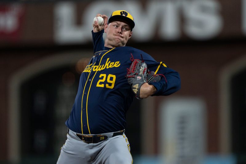 Sep 10, 2024; San Francisco, California, USA;  Milwaukee Brewers pitcher Trevor Megill (29) pitches during the eighth inning against the San Francisco Giants at Oracle Park. Mandatory Credit: Stan Szeto-Imagn Images