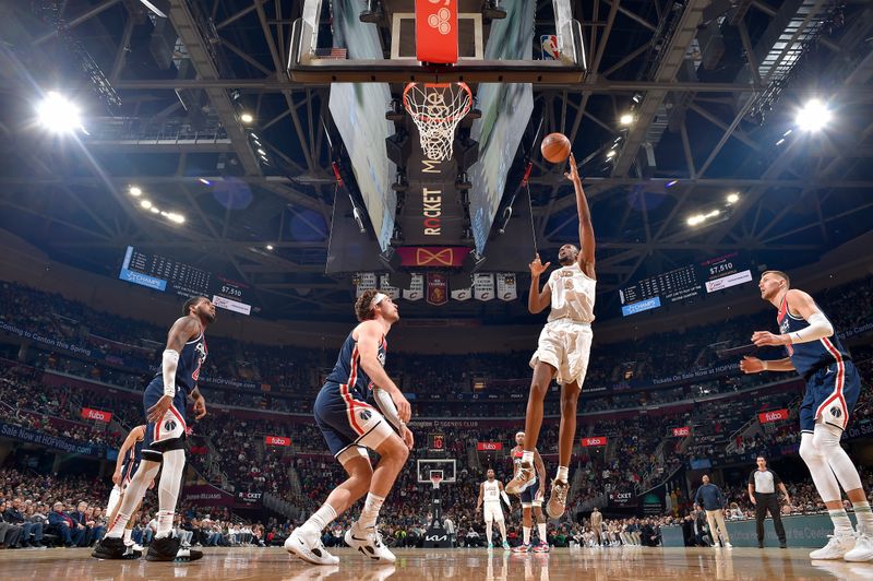 CLEVELAND, OH - MARCH 17: Evan Mobley #4 of the Cleveland Cavaliers shoots the ball during the game against the Washington Wizards  on March 17, 2023 at Rocket Mortgage FieldHouse in Cleveland, Ohio. NOTE TO USER: User expressly acknowledges and agrees that, by downloading and/or using this Photograph, user is consenting to the terms and conditions of the Getty Images License Agreement. Mandatory Copyright Notice: Copyright 2023 NBAE (Photo by David Liam Kyle/NBAE via Getty Images)